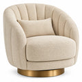 Sillón tapizado de líneas curvas con acolchado acanalado, beige y dorado