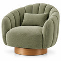 Sillón tapizado de líneas curvas con acolchado acanalado, verde y marrón